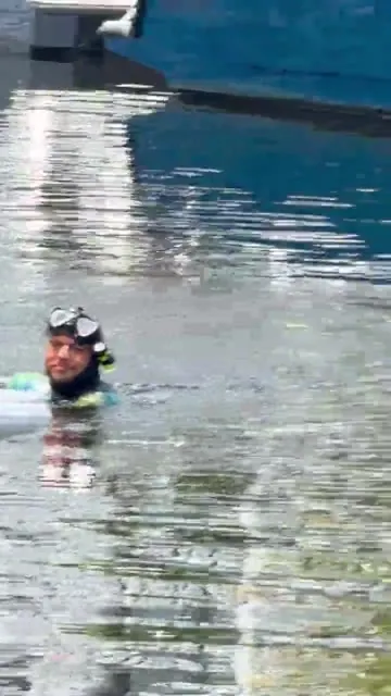 Diver working at the marina